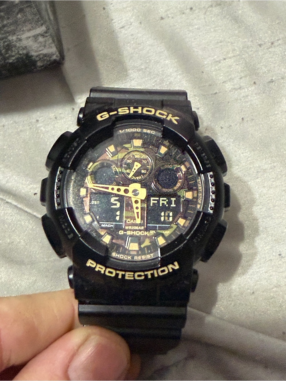 G-Shock Black and Gold Resin Sport Watch camo face